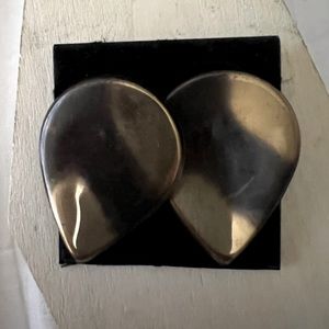 Two sets of similar earrings